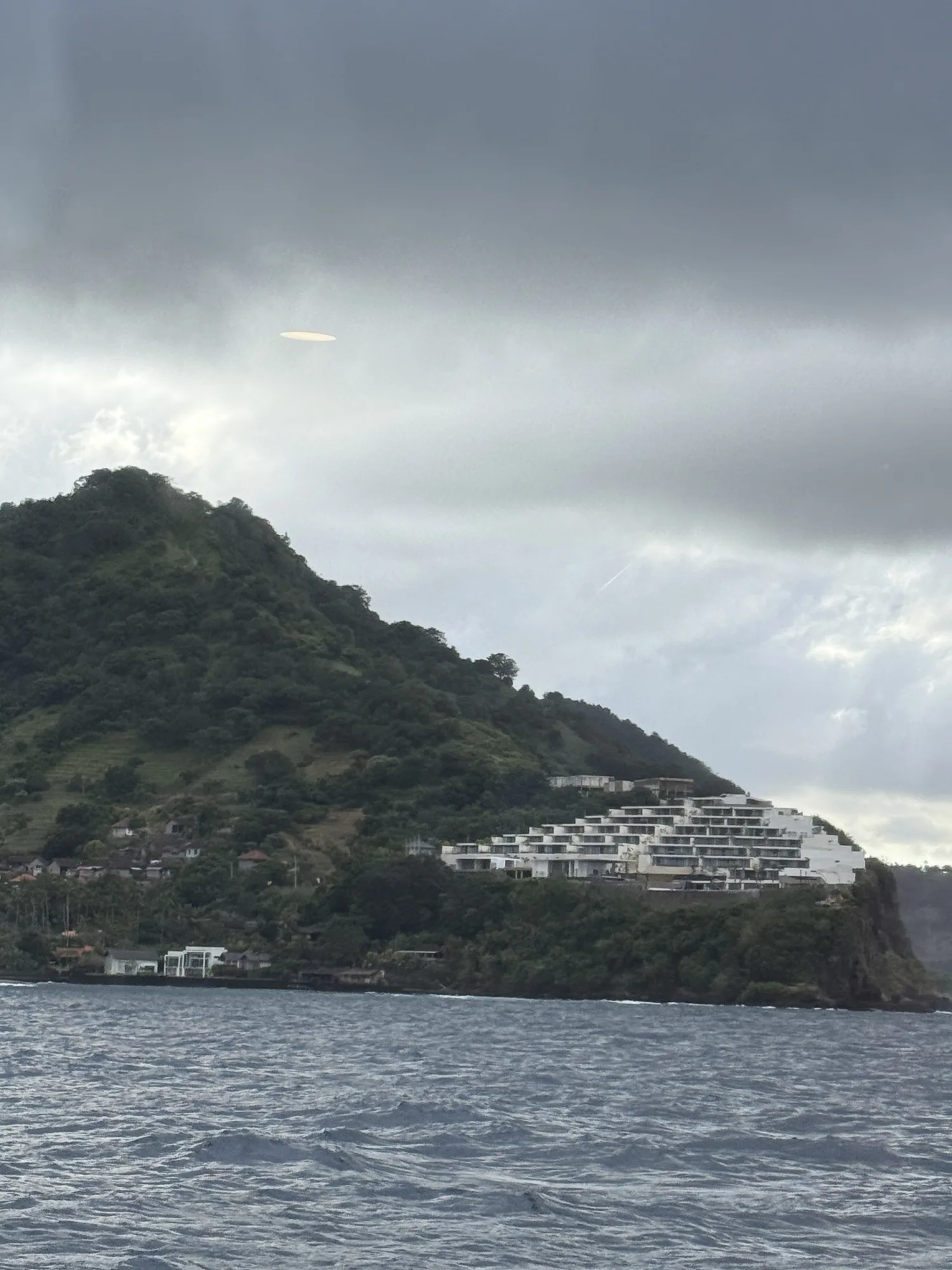 Looking back at the Bali coast from the ferry