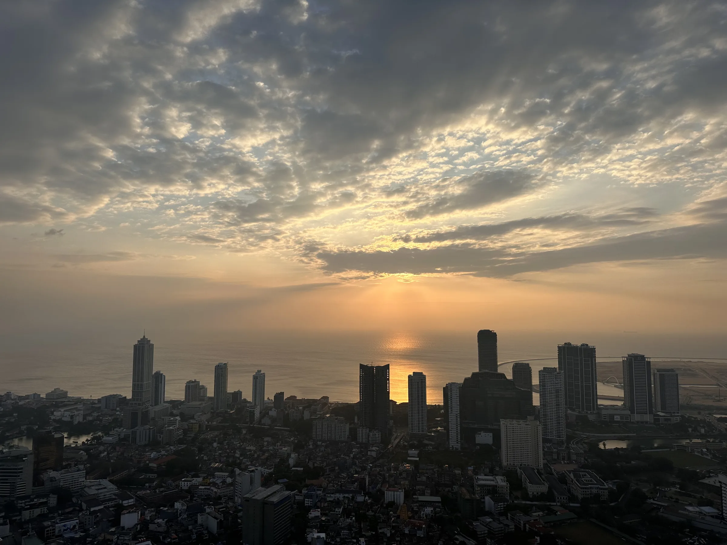 Sunset over the sea and the Colombo skyline from the top of Lotus Tower